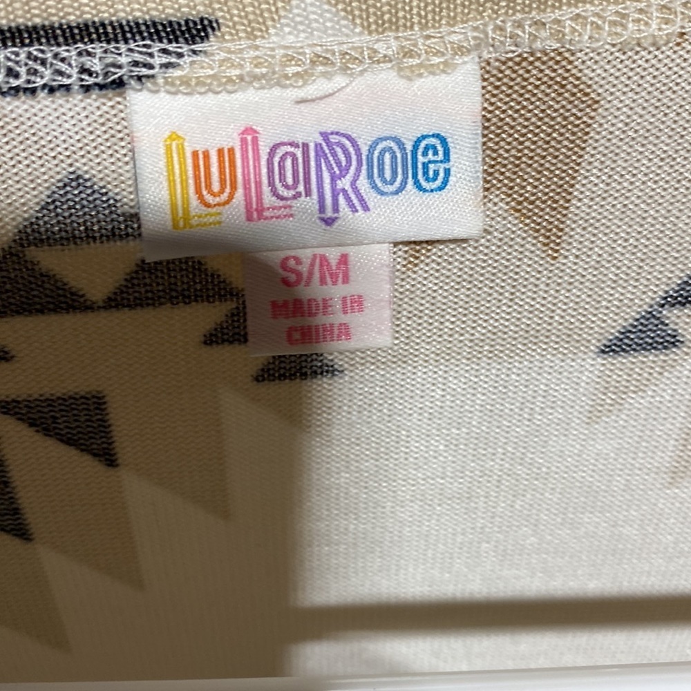 The new Lularoe Savannah is a sleeveless cape​​​​ - Picture 3 of 5
